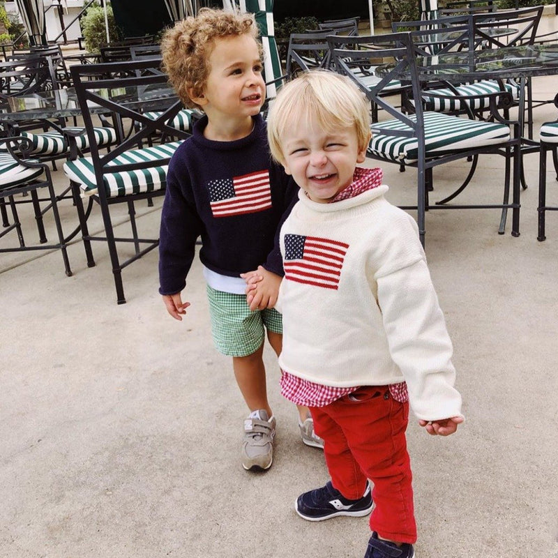 Two boys wearing American Flag rollneck sweaters